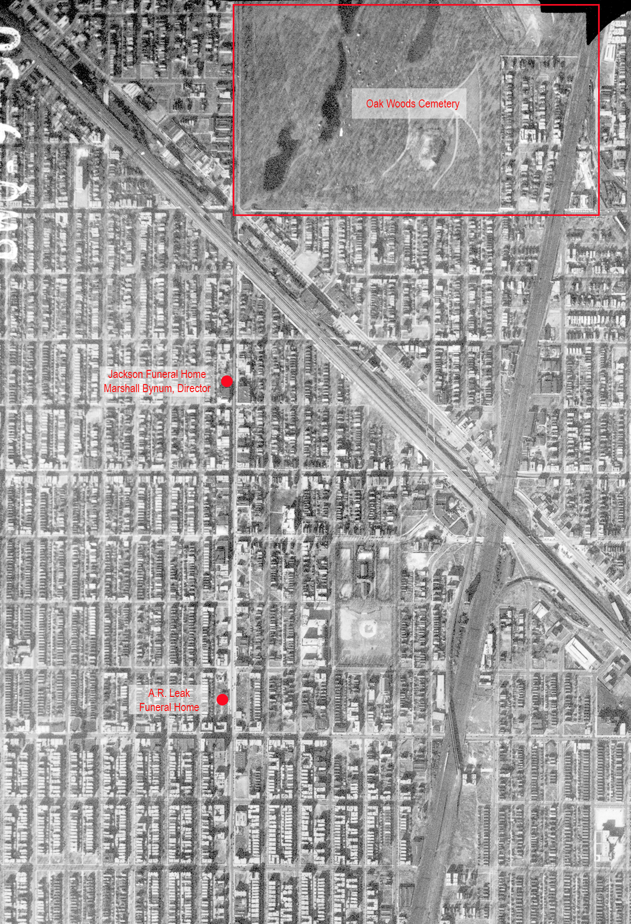 Black and white aerial photo of the area near Oak Woods cemetery with the A.R. Leak and Jackson funeral homes highlighted (close the cemetery)