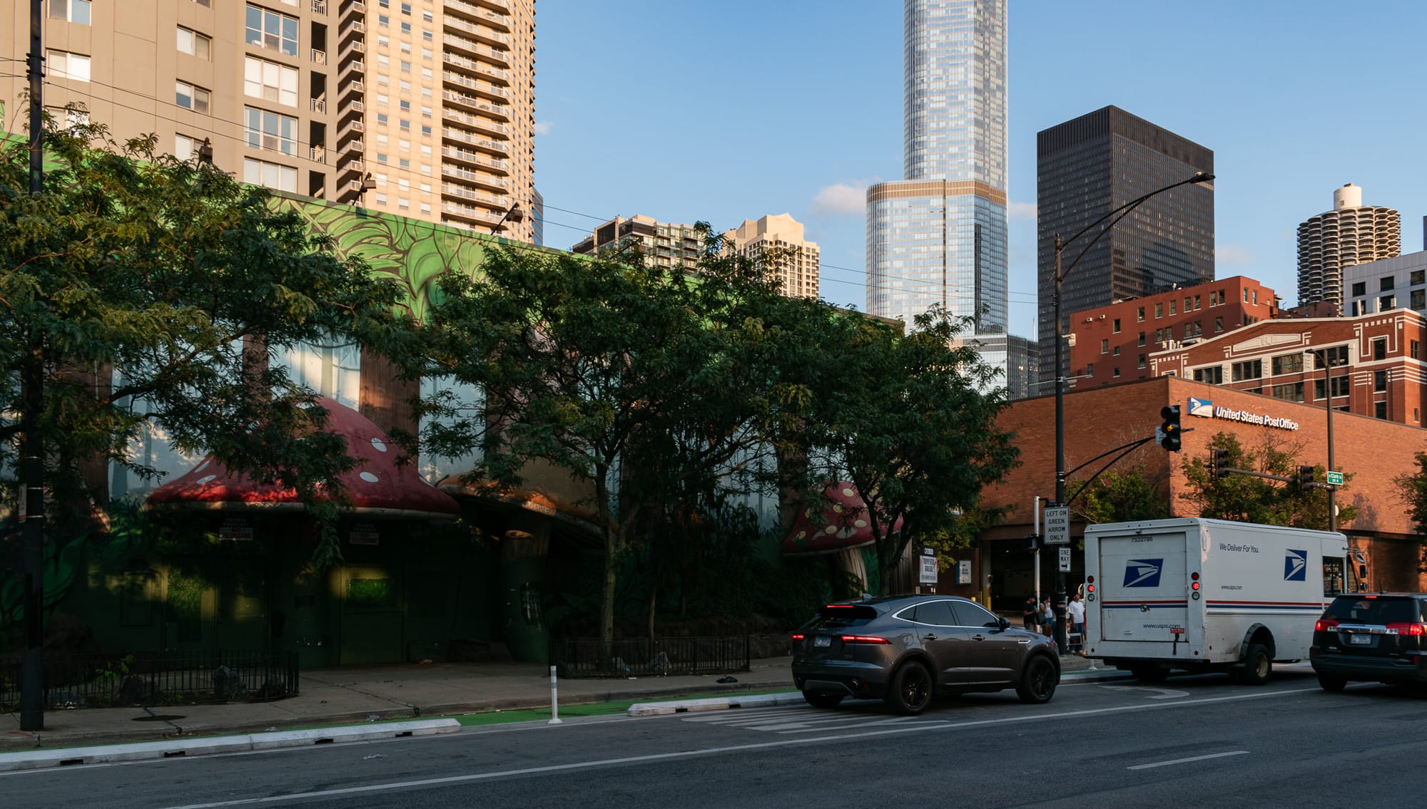 Vacant Rainforest Cafe building in front, Trump Tower and the IBM Building in the distance
